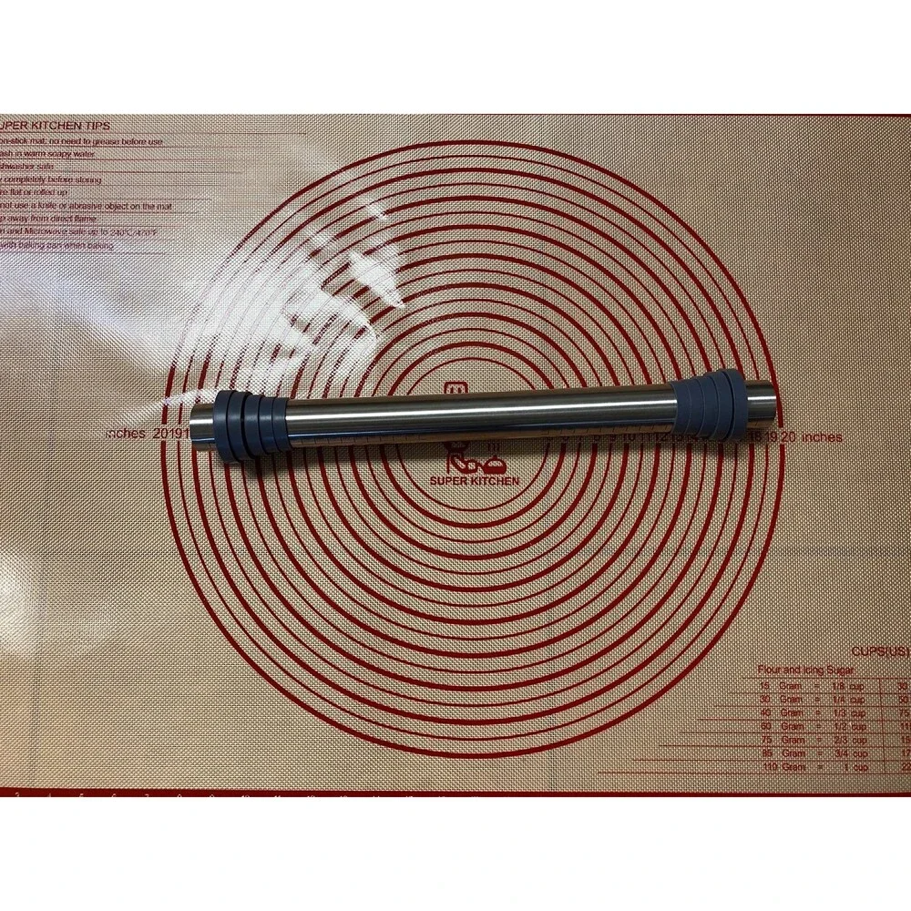 New baking mat 24x36 & metal rolling pin with rings
